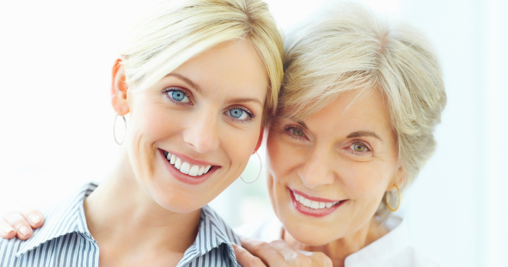 Mother and daughter posing together